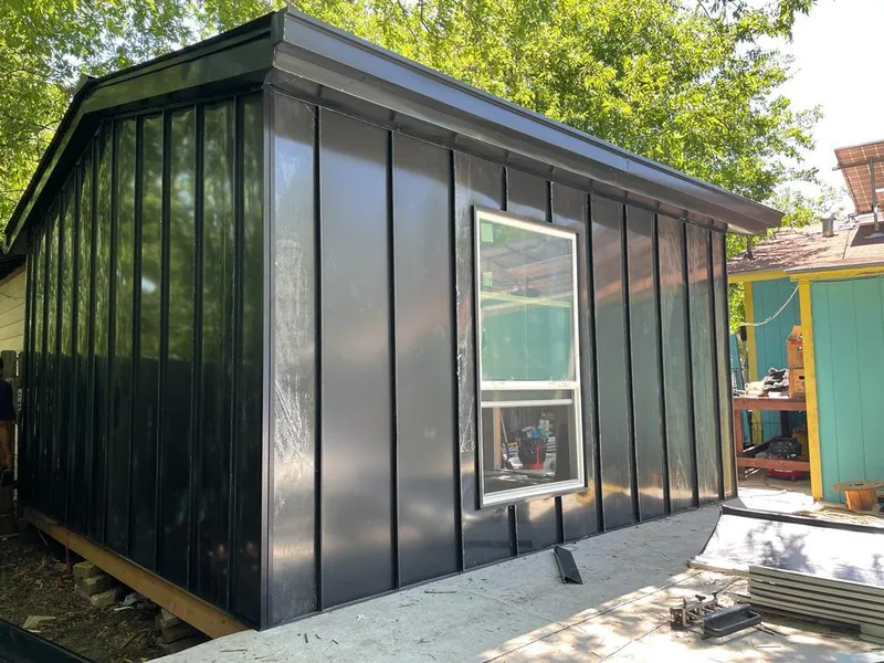 Black standing seam metal wall panels for Metal Roof Installation in Clemson